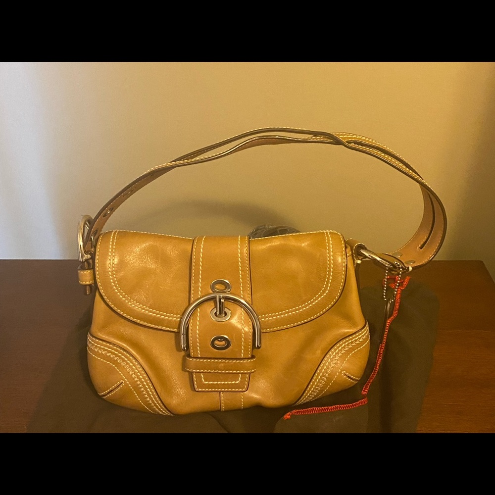 Camel over the shoulder Coach bag. Excellent condition.